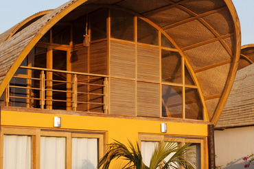 The master bedroom of all our houses looks out on the inviting cool blue waters of the pool